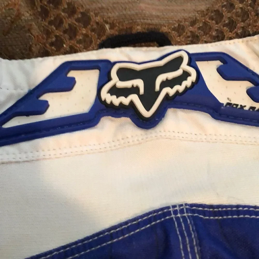 Fox Racing 180 size 30 motorcycle pants one tear